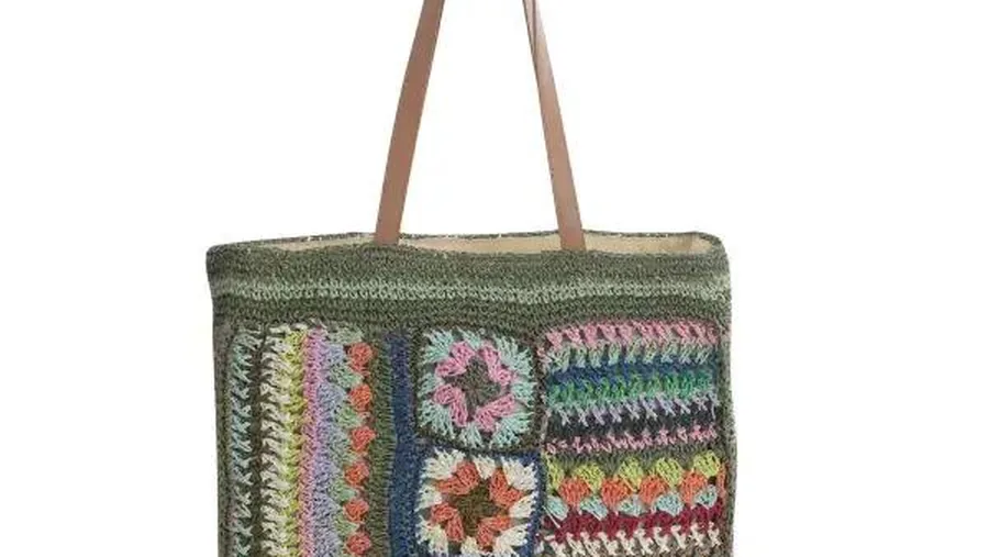Close up of woven polypropylene bag texture showing grid pattern